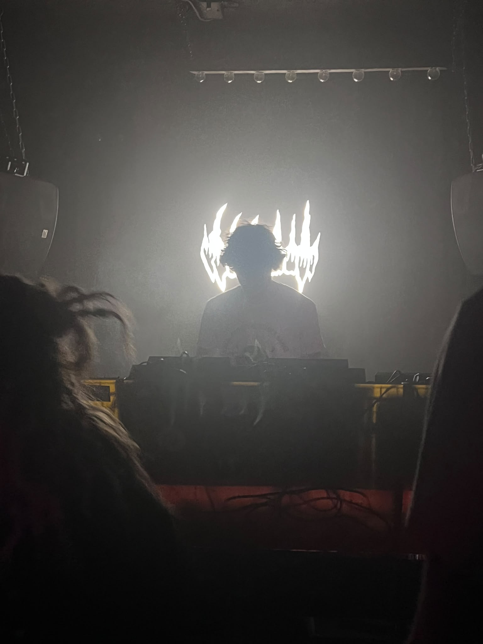 DJ performing during a live session at Black Teeth
